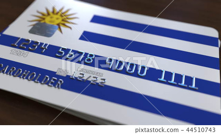 Plastic bank card featuring flag of Uruguay. National banking system related 3D rendering Plastic bank card featuring flag of Uruguay. National banking system related 3D rendering 44510743