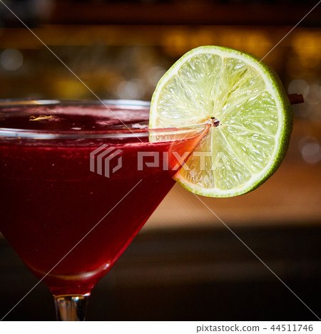 Cosmopolitan - Alcoholic Cocktail made from Vodka, Cointreau, Lime Juice and Cranberry Juice. 44511746