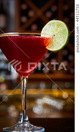 Cosmopolitan - Alcoholic Cocktail made from Vodka, Cointreau, Lime Juice and Cranberry Juice. 44511758