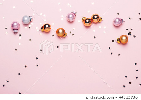 Holiday Christmas pink background with golden ball Holiday Christmas pink background with golden ball 44513730