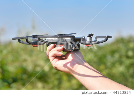 Hand caught drone 44513834