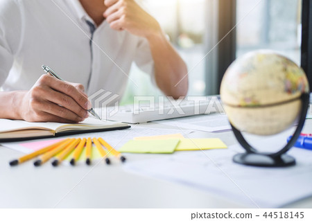 Businessman working writing making note business plan and graphi Businessman working writing making note business plan and graphi 44518145