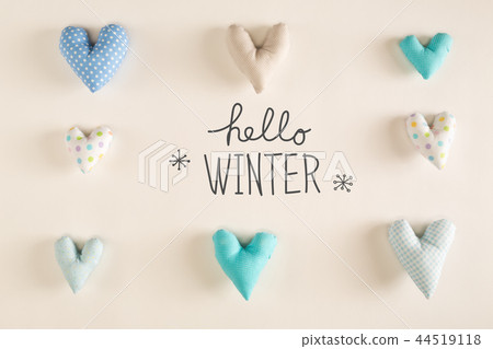Hello Winter message with blue heart cushions 44519118