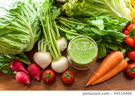 Green smoothie and vegetables wood grain table Green smoothie and vegetables wood grain table 44519406