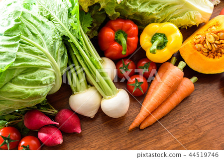Many vegetables wood grain table 44519746