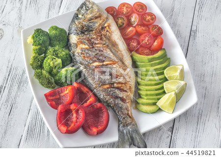 Grilled sea bream fish with vegetables Grilled sea bream fish with vegetables 44519821