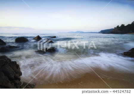 tropical beach scenery over sunrise background 44524782