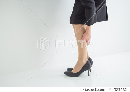 Woman touching calf Woman touching calf 44525982