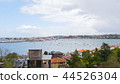 Boats floating on the Vidasoa River on the French-Spain border 44526304
