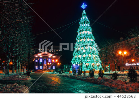 Beautiful urban Christmas tree green illumination 44528568