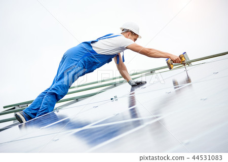 Installing of solar photo voltaic panel system 44531083