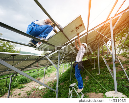 Installing of solar photo voltaic panel system 44531085