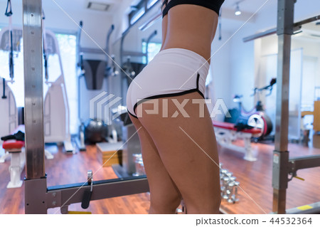 Woman training at the gym Woman training at the gym 44532364