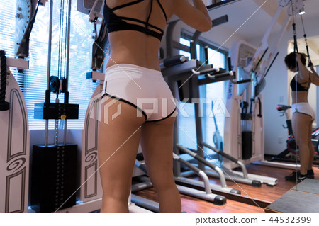 Woman training at the gym 44532399
