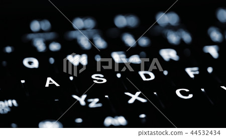 Closeup of laptop keyboard illumination. Computing 44532434