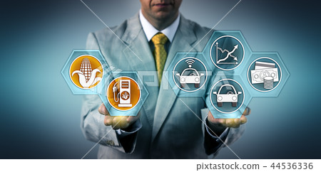 Executive Evaluating Cost Savings Of Biofuels Executive Evaluating Cost Savings Of Biofuels 44536336