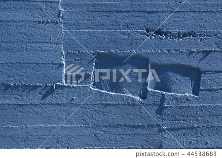 Bright sky blue textured wall Bright sky blue textured wall 44538683