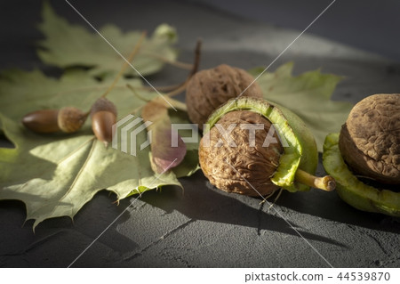 Fresh harvest of walnuts in a green shell and peel 44539870