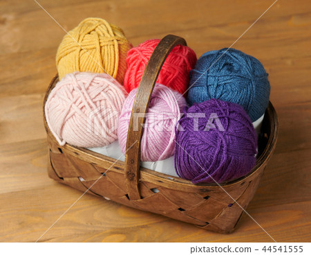 colorful wool threads for knitting on wooden 44541555