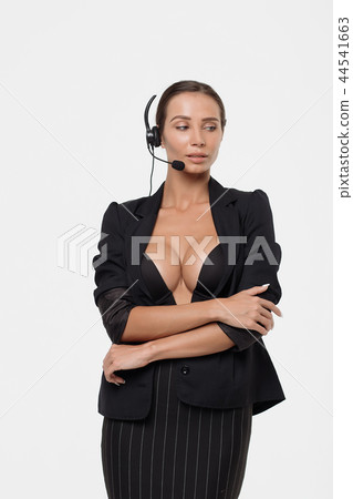 Lady with deep neckline and head microphone 44541663