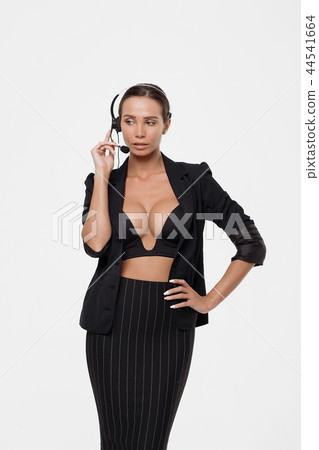 Lady with deep neckline and head microphone 44541664