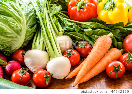 Many vegetables wood grain table 44542139