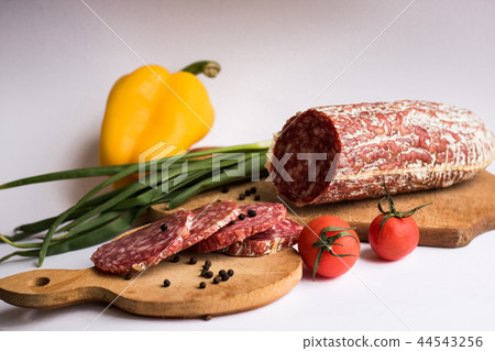 Sausage with potatoes and yellow pepper Sausage with potatoes and yellow pepper 44543256