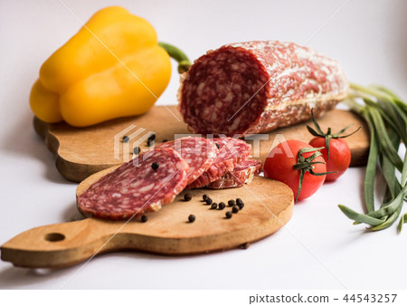 Sausage with pieces and potatoes and yellow pepper 44543257