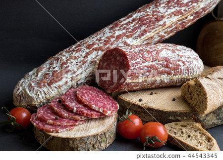 Different food on dark wooden table Different food on dark wooden table 44543345