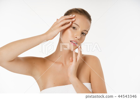 Beautiful Young Woman Face Portrait Beauty Skin Care Concept. Fashion Beauty Model isolated on white Beautiful Young Woman Face Portrait Beauty Skin Care Concept. Fashion Beauty Model isolated on white 44543346