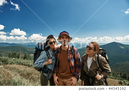 Cheerful friends are spending active time in nature Cheerful friends are spending active time in nature 44545192