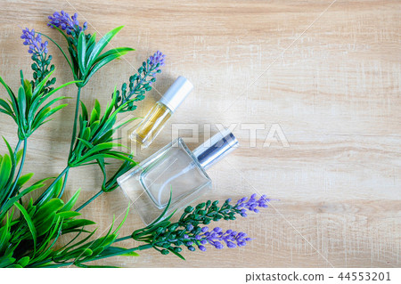 Perfume bottle with flower 44553201