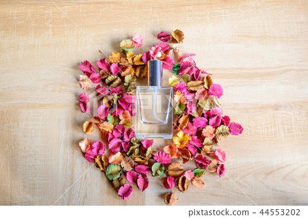 Perfume bottle with flower Perfume bottle with flower 44553202