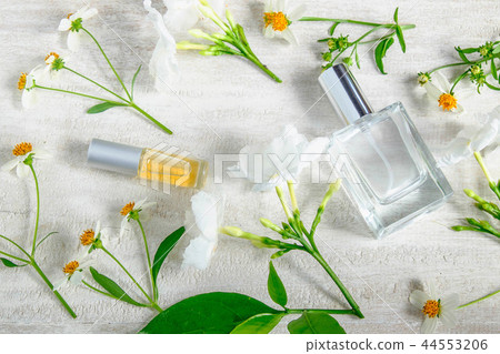 Perfume bottle with flower Perfume bottle with flower 44553206