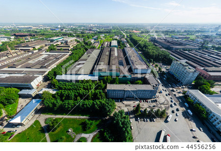 Aerial city view with crossroads and roads, houses buildings. Copter shot. Panoramic image. Aerial city view with crossroads and roads, houses buildings. Copter shot. Panoramic image. 44556256