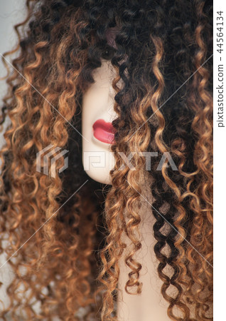 woman face of mannequin with afro wig woman face of mannequin with afro wig 44564134
