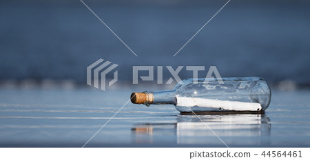 Message in a bottle found on the beach Message in a bottle found on the beach 44564461