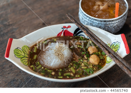 Braised beef clear noodle with meat ball soup stew 44565740