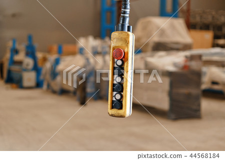 close up remote control switch for overhead crane in manufacture workshop close up remote control switch for overhead crane in manufacture workshop 44568184