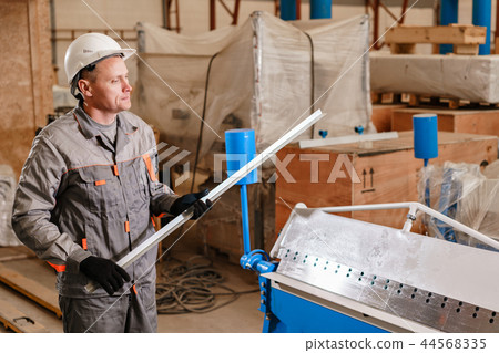 metal corner of zinced. Tool and bending equipment for sheet metal. manufacture workshop. the metal corner of zinced. Tool and bending equipment for sheet metal. manufacture workshop. the 44568335