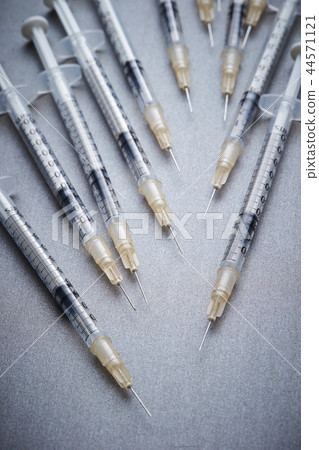 Syringe and gray background Copy space Medical image 44571121