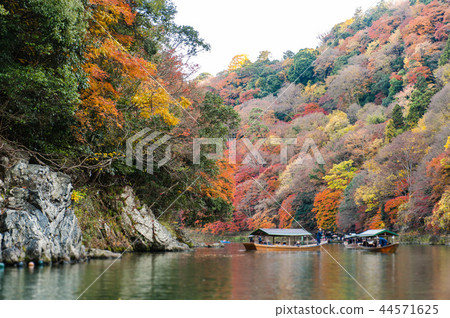 Arashiyama Togetsubashi upstream area boating, autumn leaves in Kyoto, Japan 44571625