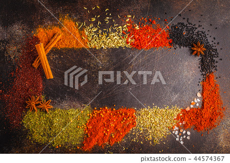 Different kind of spices on dark background. Different kind of spices on dark background. 44574367