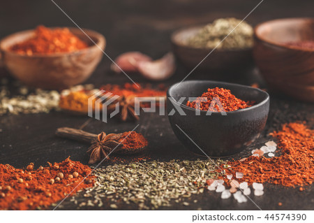 Different kind of spices on dark background. 44574390