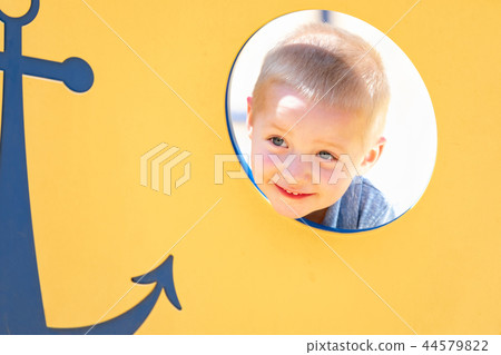 Happy Young Boy Having Fun At The Playground 44579822