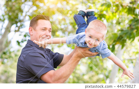 Young Boy Having Fun With His Father At The Park 44579827