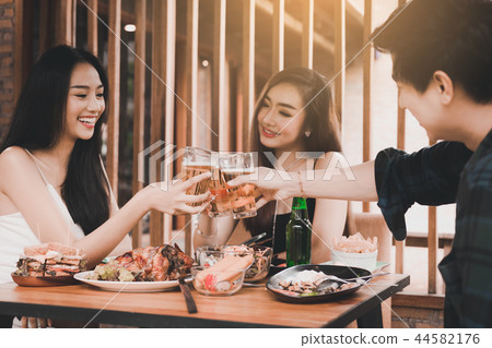 Teenager having enjoy drinking beer and clinking 44582176