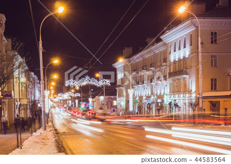 Night city of Gomel with traffic cars on the road Night city of Gomel with traffic cars on the road 44583564
