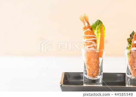 batter-fried prawns on wood batter-fried prawns on wood 44585349