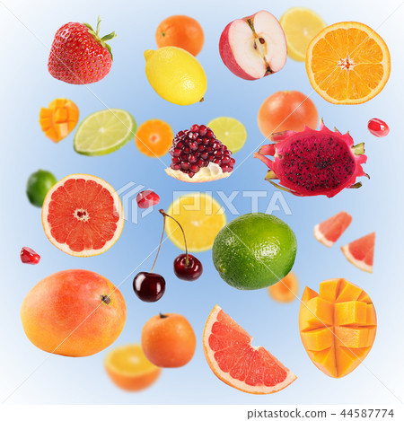 Collage of different fruits on a blue background Collage of different fruits on a blue background 44587774